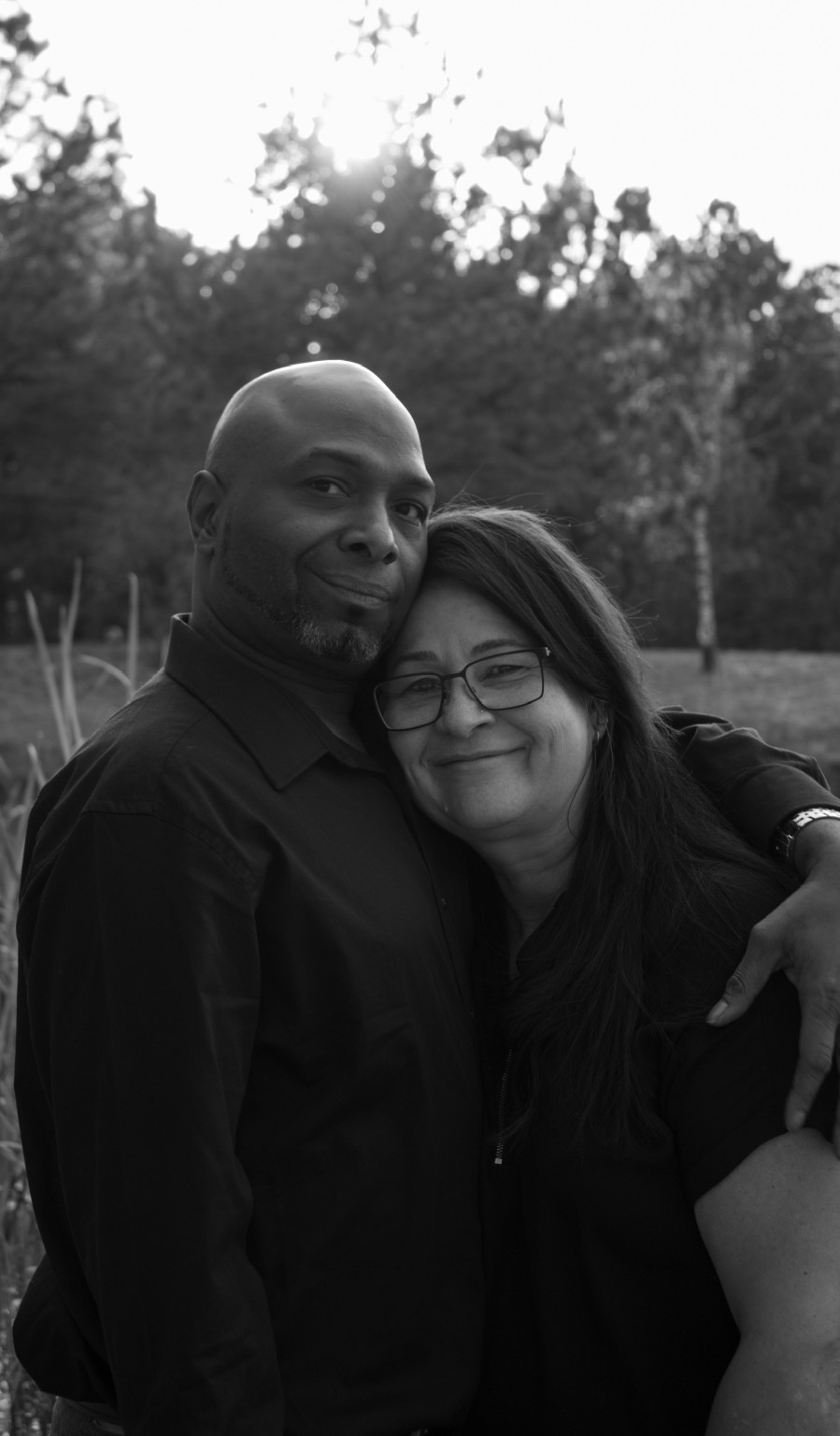 A black-and-white portrait together outdoors