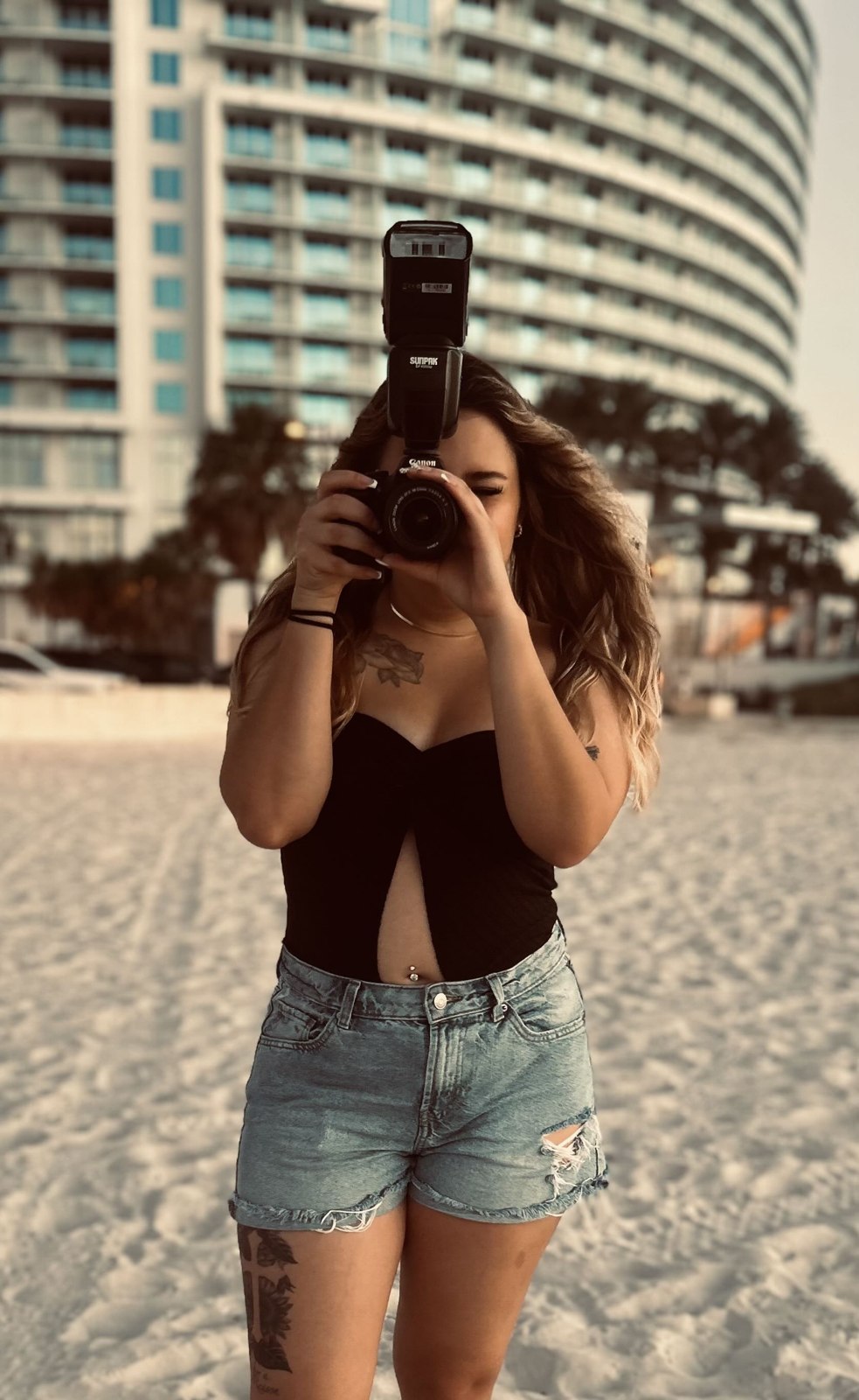 Natalie holding her camera